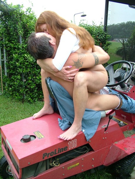Older amateur Dee Delmar hops on her guys dick while he mows the lawn