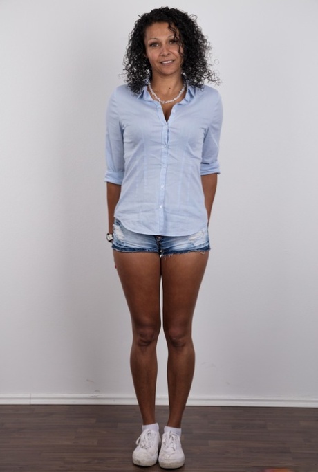 Latina female takes off her clothes to earn enough money for a flight home