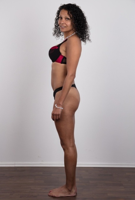 Latina female takes off her clothes to earn enough money for a flight home
