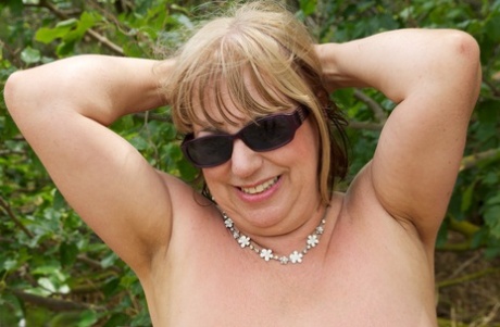 Fatty amateur mature slut Speedy Bee gets down and dirty in sand