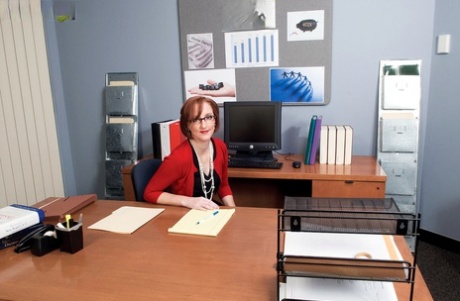 Redhead office lady Layla Redd sucks off and rides her employee