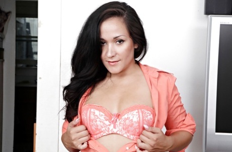 Brunette Latina Serenity Knox teases her mature pussy in pantyhose