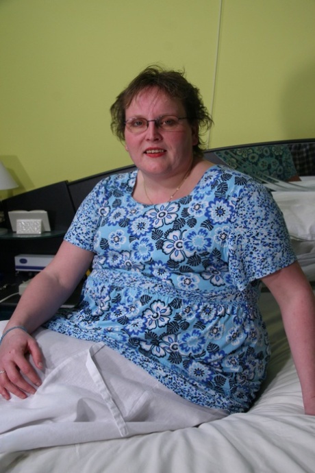 Chubby granny Gonny reveals her huge ass and plays with a sex toy