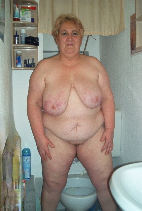 Amateur BBW Silke plays with her huge natural tits and toys her fat pussy