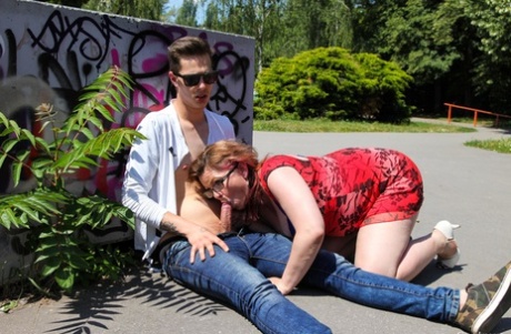Horny granny in glasses Sophie sucks big knob and rides it under the bridge