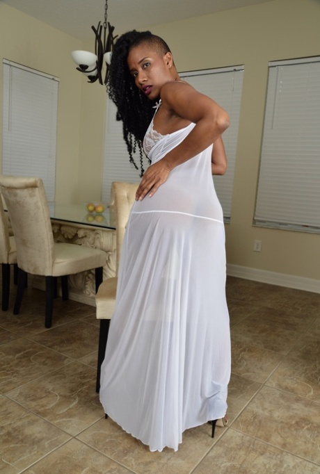 Gorgeous ebony babe JetSet Jasmine strips naked & spreads her shaved pussy