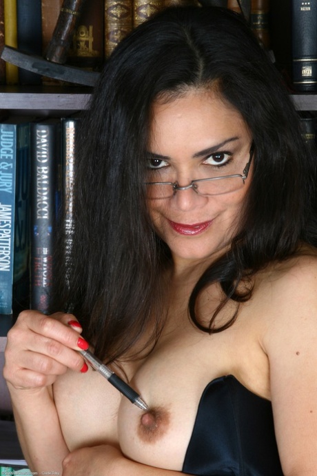 Naughty MILF Camille C shows off her tits and spreads her shaved pussy