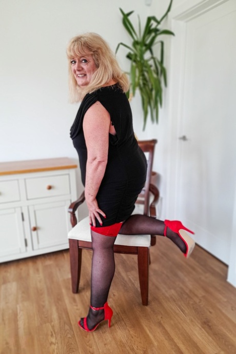 Mature fatty Nicola Hotwife stripping to her lingerie and masturbating