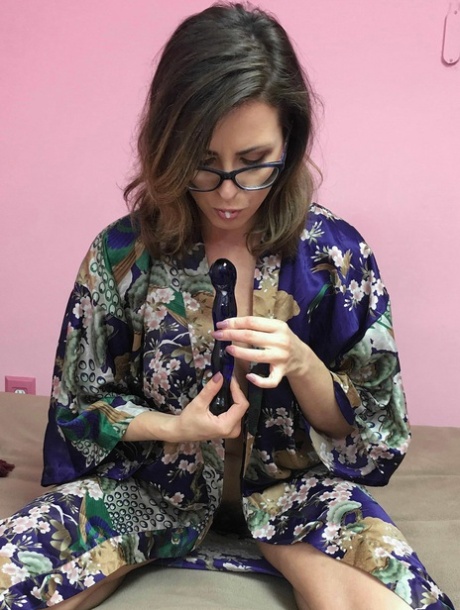 Gorgeous housewife Helena Price services her hairy cunt with a dildo