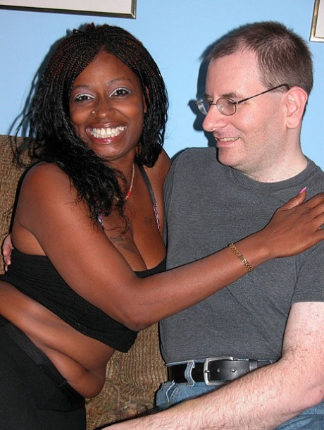 Cute ebony mature with a big ass Honey takes a white boner in her mouth