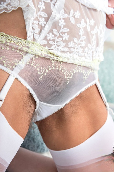 Ageless beauty MILF Ellen B displays her flawless body and a wicked hairy muff