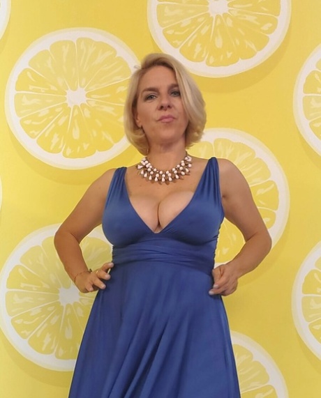 Glamorous amateur teases with her big tits in various sexy outfits